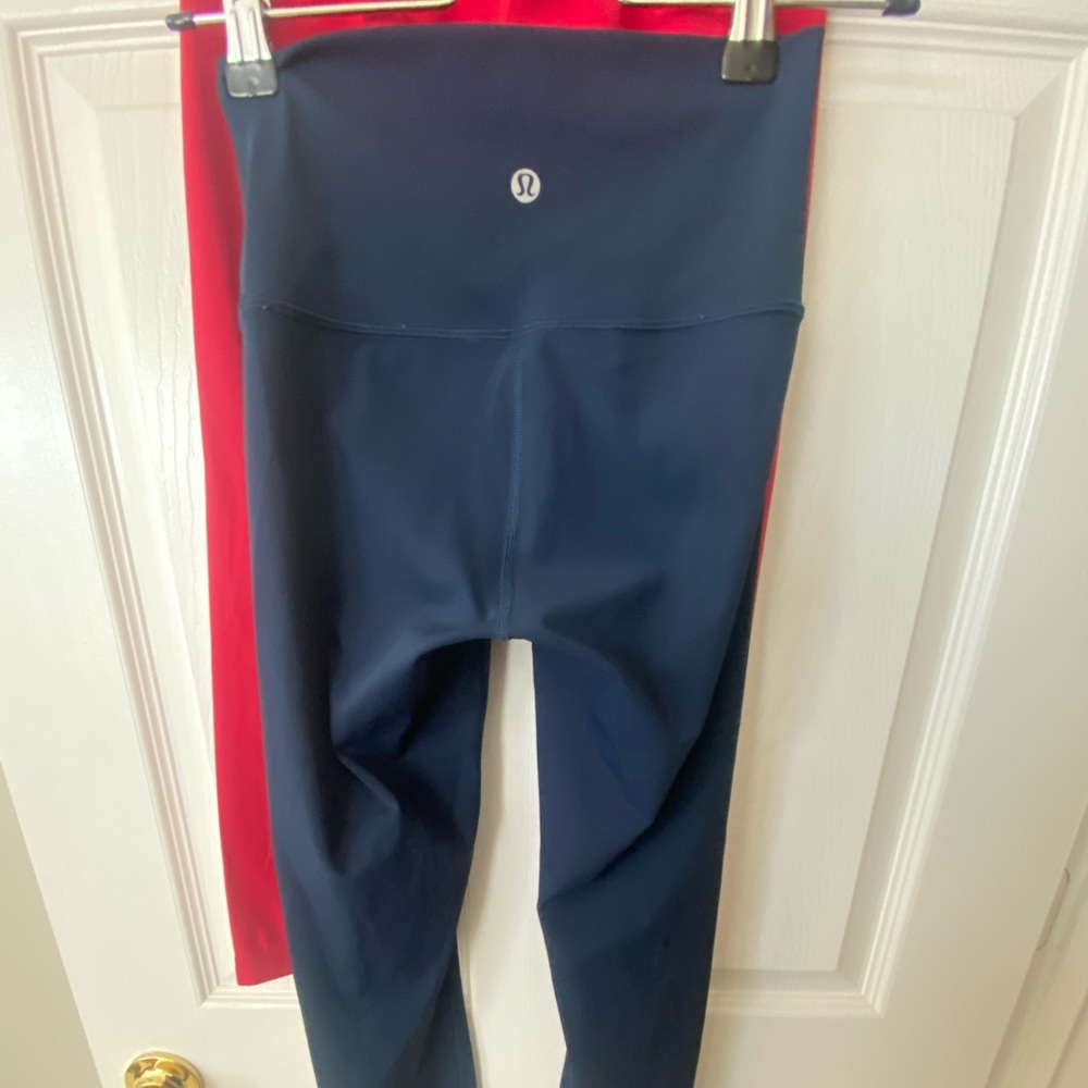 2 pairs of Lululemon leggings for girls size 2. used.